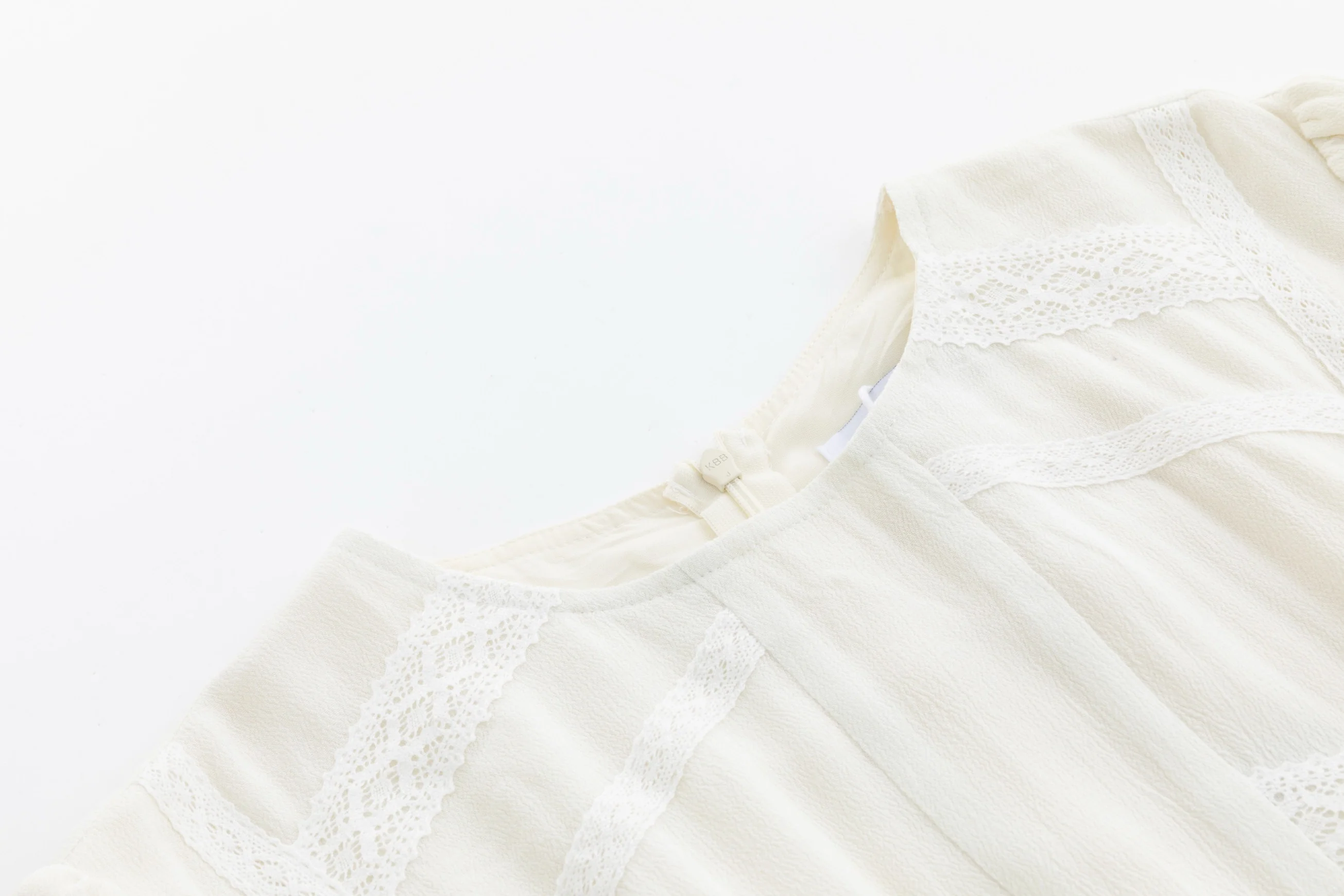 Solid Ivory Dress With Lace Trimming - Image 5