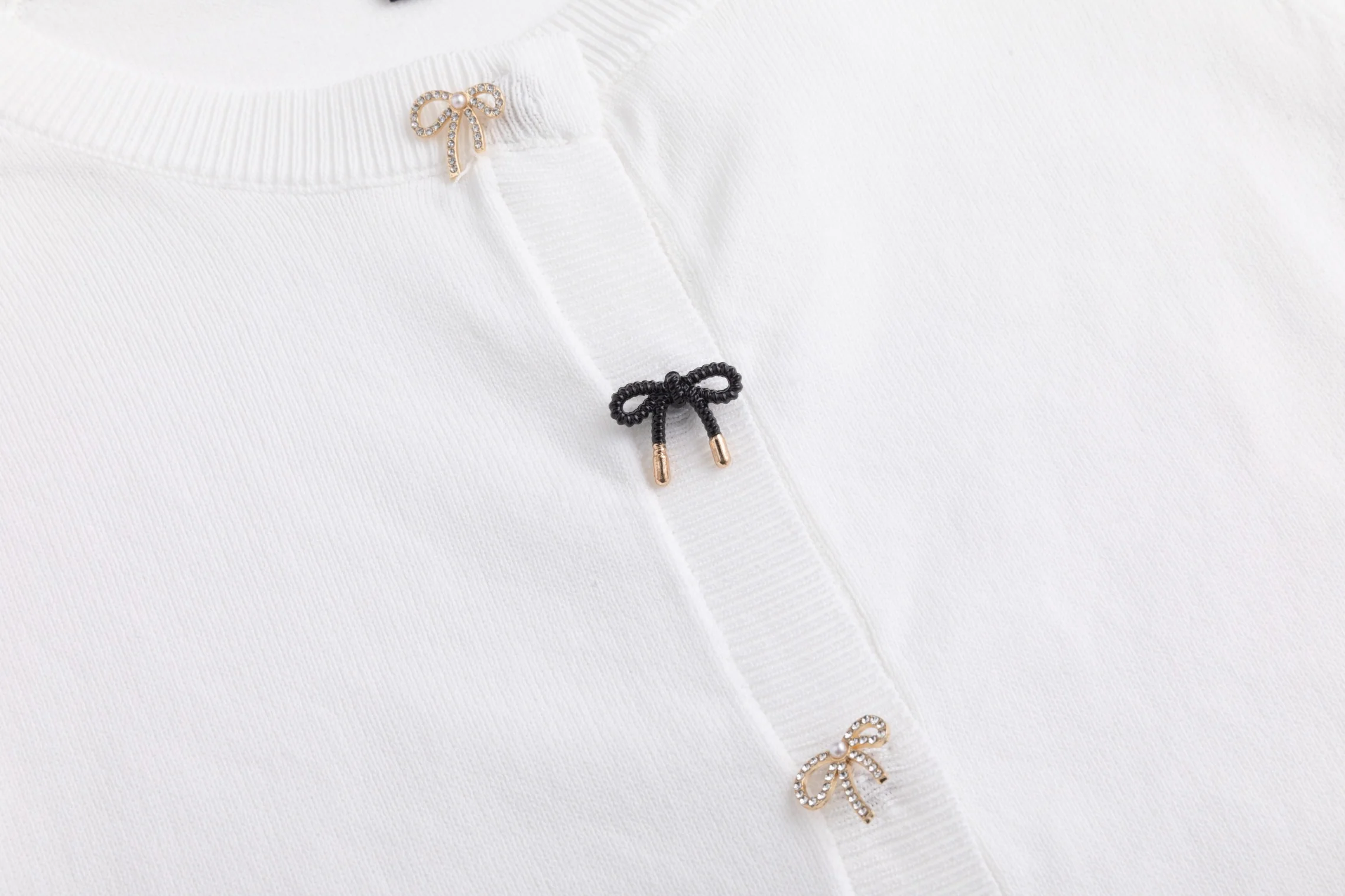 White Cardigan With Bow Shaped Buttons - Image 5